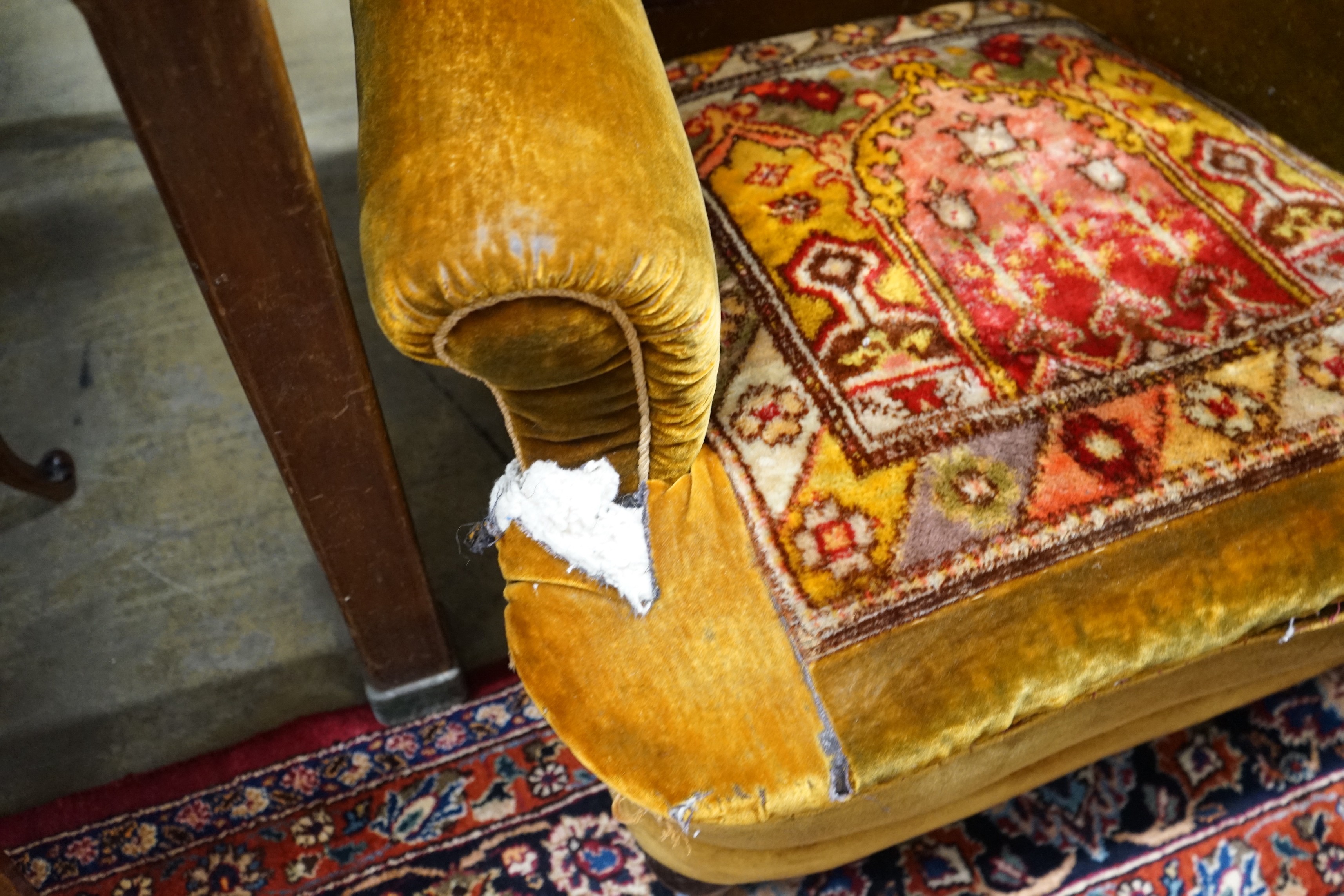 A pair of Victorian armchairs with carpet upholstery, width 90cm, depth 96cm, height 94cm